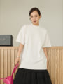 ロゴ刺しゅう入りニットTシャツ
